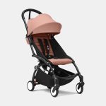 Stokke YOYO³ cu cadru negru și pachet 6+ Ginger